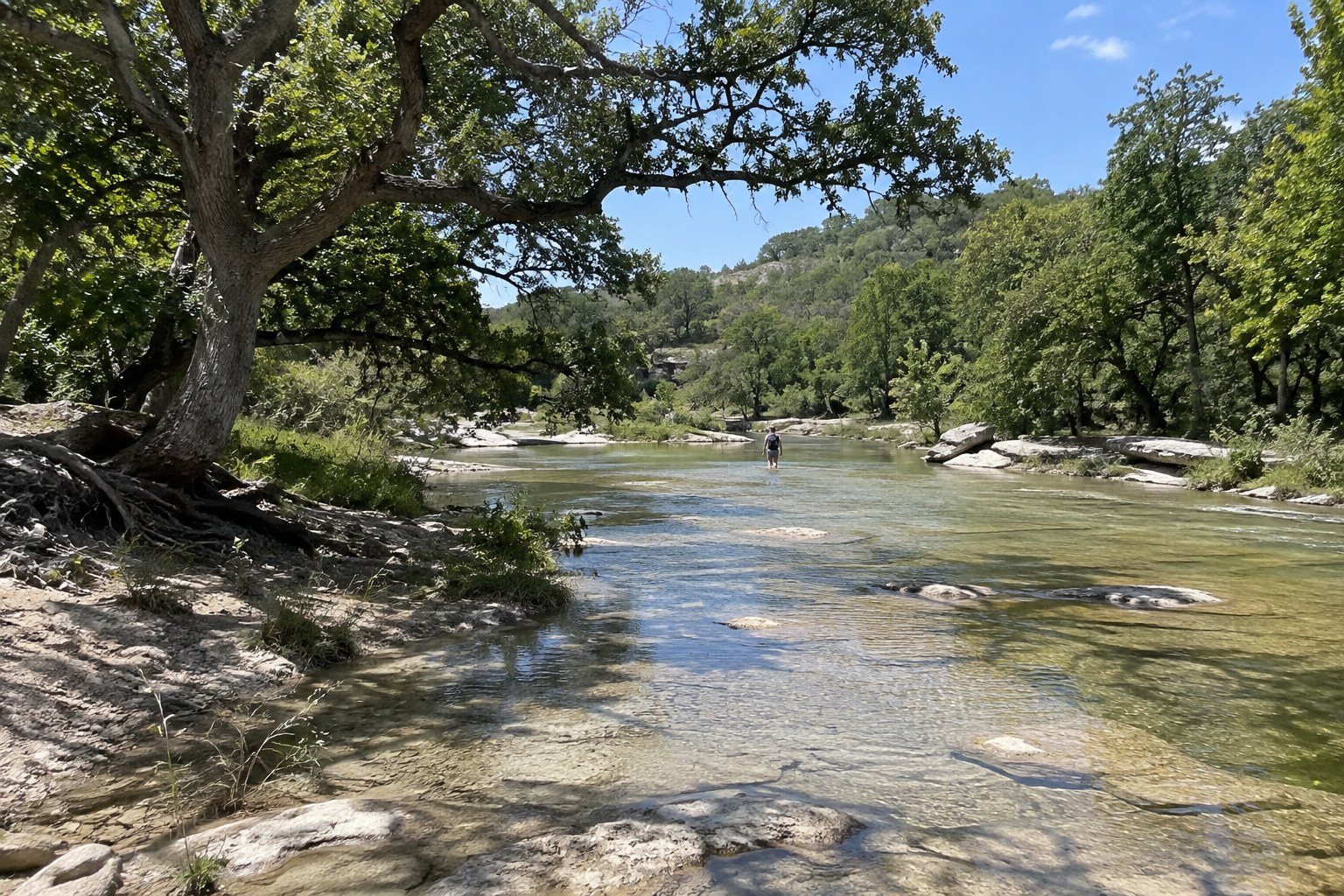 Clear spring-fed swimming hole in the Texas Hill Country near Fredericksburg